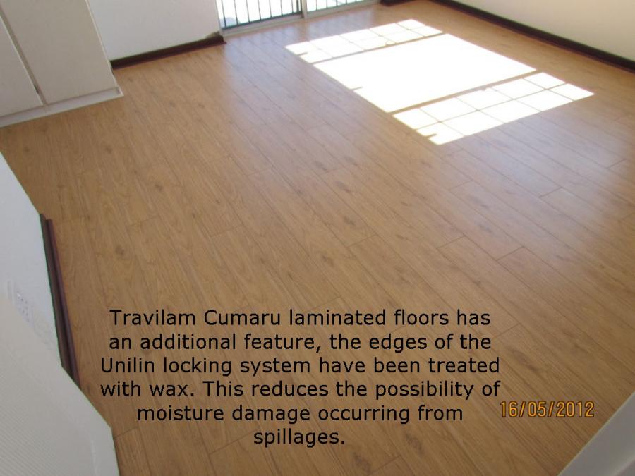 TraviataTravilamAC4Cumaru8mmLaminatedFlooringwwwexactflooringcoza3LaminatedWoodedFloorsInstalled.jpg